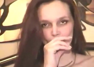 Brunette is going to worship hard cock of a dog